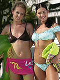 Tantalizing sirens rub and finger pink pussies poolside