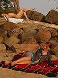 eauties bask at the beach and enjoy total pussy pleasure