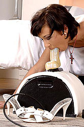 Brunette cutie riding the sybian