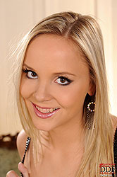 Blonde babe Monique stripteasing