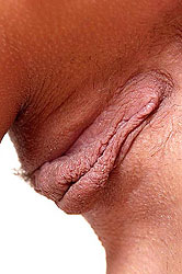 Sensual babe posing and fingering