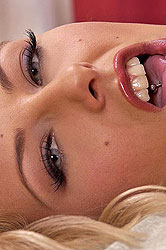 Horny Mia masturbates with a dildo