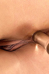 Young brunette striping & spreading