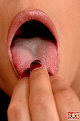 Sexy brunette babe fingers her ass