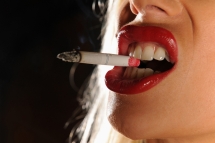 Very busty babe Puma Swede is smoking in stockings