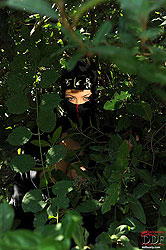 Busty ninja Shione Cooper outdoors