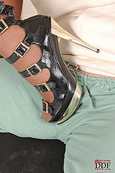 Healing his big cock with her feet