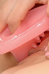 Monalee fucks her twat with a dildo