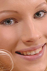 Teen Gitta Blond plays with rattles