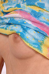 Teen Gitta Blond plays with rattles