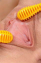 Teen Gitta Blond plays with rattles