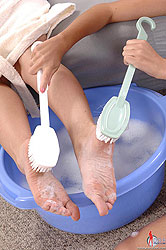 Two young blondes have lesbian bath