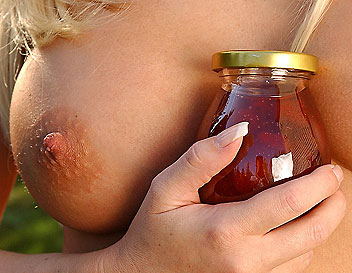 Sexy blonde Chloe playing with foods at picnic