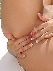 Sexy brunette Eve dildoing on the river in a boat