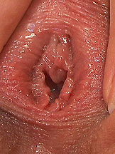 Kinky blonde teengirl toying with a big speculum