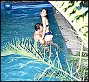 Teenage brunette loves to get fucked in a swimming pool