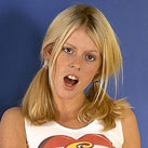 Blonde teenage cutie stuffing her muff with a huge dildo