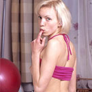 Cute teenage blonde showing her perky firm boobies on cam