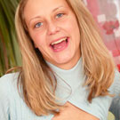 Sexy teenage blondie showing her sexy boobies and wet slit