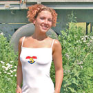 Teenage redhead toying her wet and tight muff in the garden