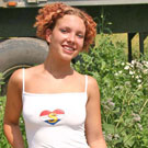 Teenage redhead toying her wet and tight muff in the garden