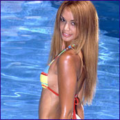 Exotic petite teen with perfect body poses for cam in pool