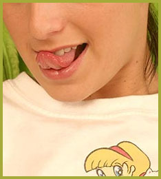 Cute teen gives a peek inside her panties of her pink lips