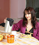 Brunette beauty seduces an old senior during her breakfast