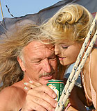 Two horny seniors fucking a blonde hottie on their boat