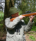 Old senior hunter fucking a brunette beauty in the wild