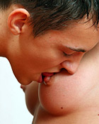 Blonde teenage girl sucking the erect dick of a teenage boy