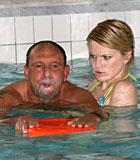 Cute female swim instructor banging a senior after drowning