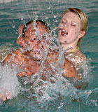 Cute female swim instructor banging a senior after drowning