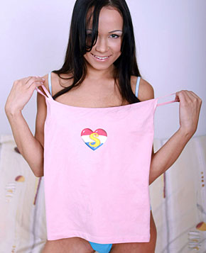 Brunette teenage girl showing her pink and wet pussyhole