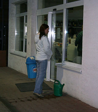  Cheap brunette girl sucking a strangers cock trough a wall