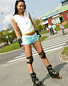 Skating brunette teen girl toying her pussy in the bushes