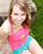 Busty teenage cutie toying her tight pussy in the backyard