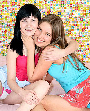 Two cute teenage sweeties fucking eachother with a strapon