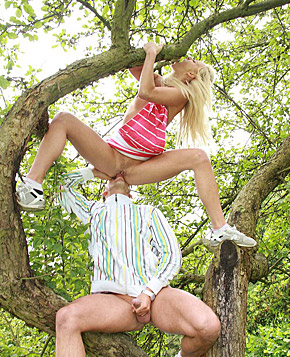 Cute teenage blondie gets boinked while climbing a tree