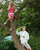 Cute teenage blondie gets boinked while climbing a tree