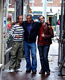 Slutty prostitute pleasing two guys their cock at same time