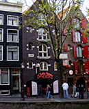 Blonde milf hooker gets dirty with two big erected cocks