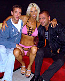 Blonde milf hooker gets dirty with two big erected cocks