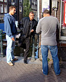 Slutty milf hooker with big tits pleasing two horny guys