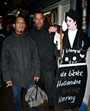 Amsterdam window hooker making a horny tourist cum hard