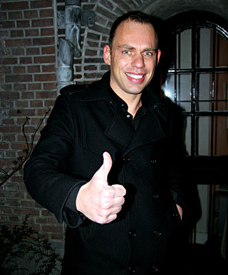 Slutty brunette hooker receives a load of cum on her face