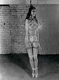 Seventies lady in a kinky mood tied up and exposed naked