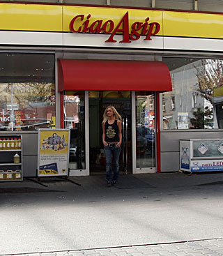 Teenage blonde tasting his anonymous cum trough the wall