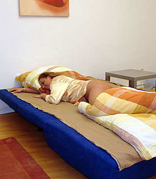 Sleeping girl gets a surprise inside her moist pussyhole