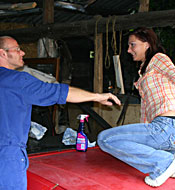 Teenage beauty sucking of an old senior his big erection